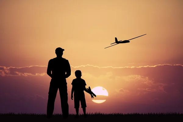 Externe gecontroleerde vliegtuigen bij zonsondergang — Stockfoto