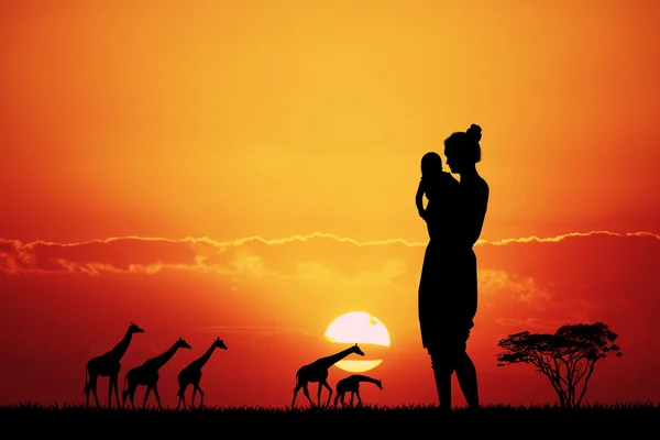 Femme dans le paysage africain au coucher du soleil — Photo