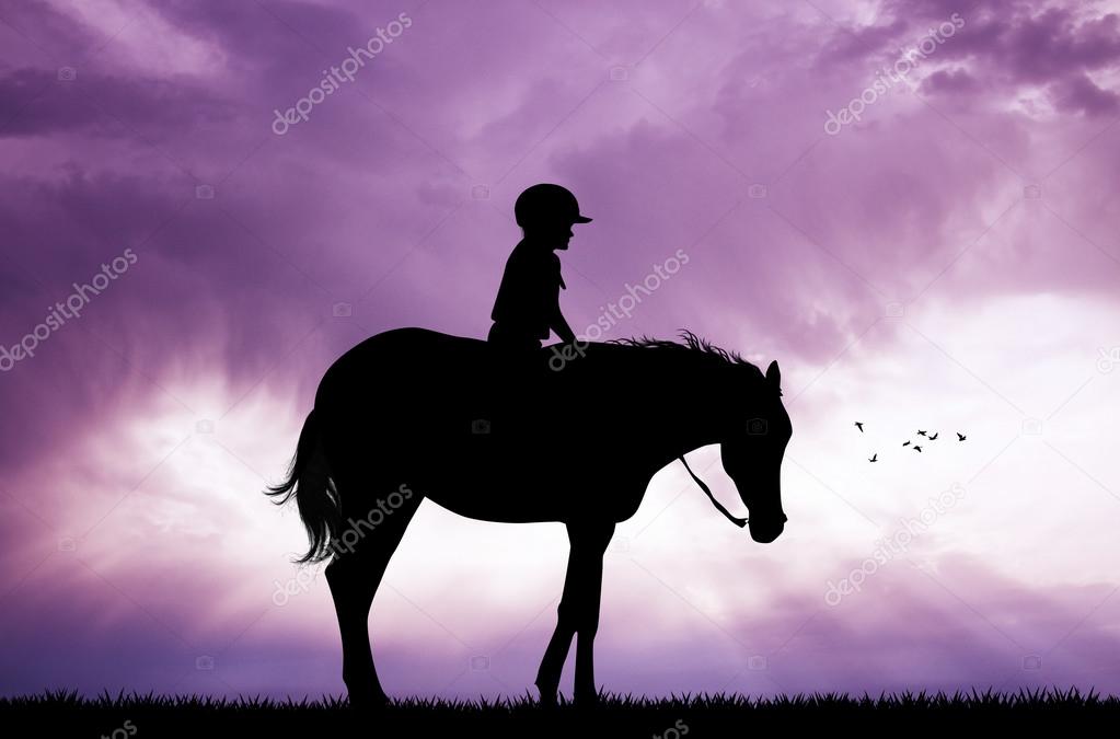 Enfant à Cheval Au Coucher Du Soleil Photographie