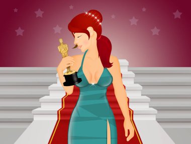 Kırmızı halıda heykeli olan aktrisin resmi.