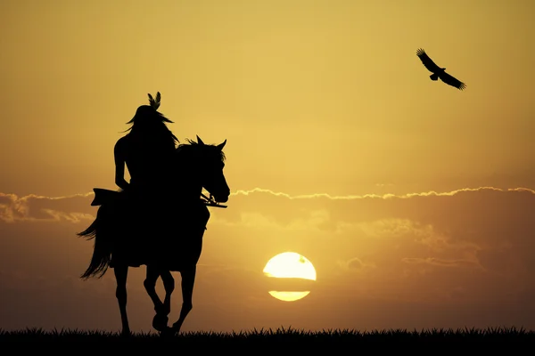 Indiano uomo silhouette al tramonto — Foto Stock