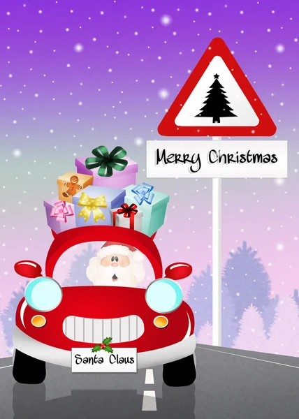 Santa claus op auto — Stockfoto
