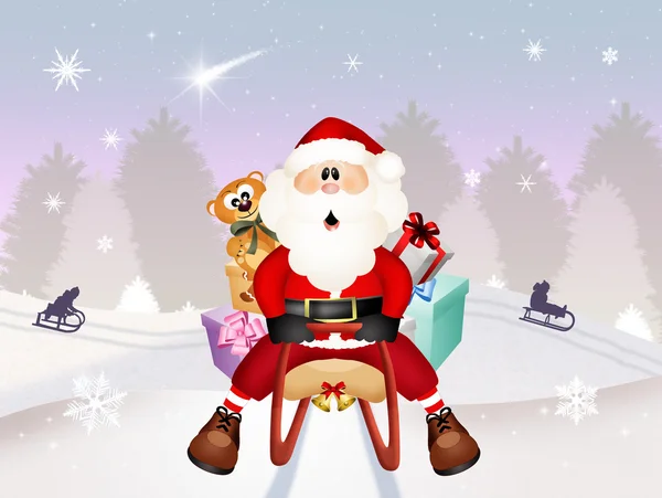 Santa claus op slee — Stockfoto