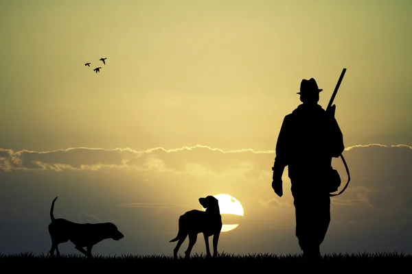 Jäger bei Sonnenuntergang — Stockfoto