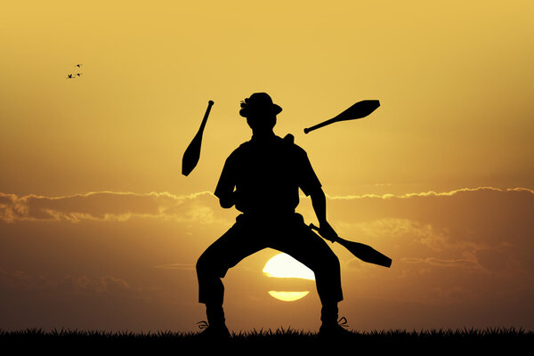 Juggler at sunset