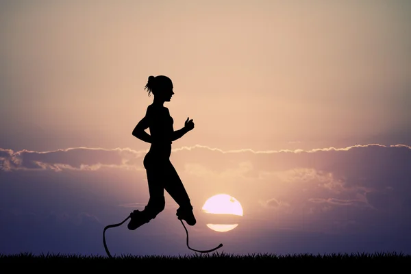 Woman runs with prosthesis — Stock Photo, Image
