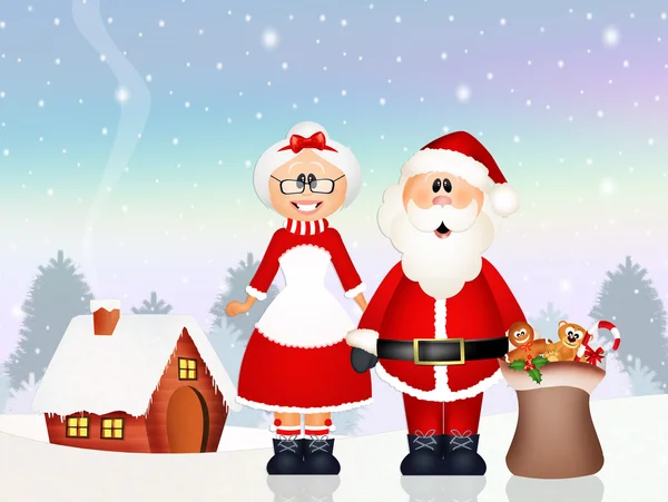 Santa Claus dostarczył dary z żoną — Zdjęcie stockowe