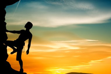 Gün batımında ücretsiz dağcı