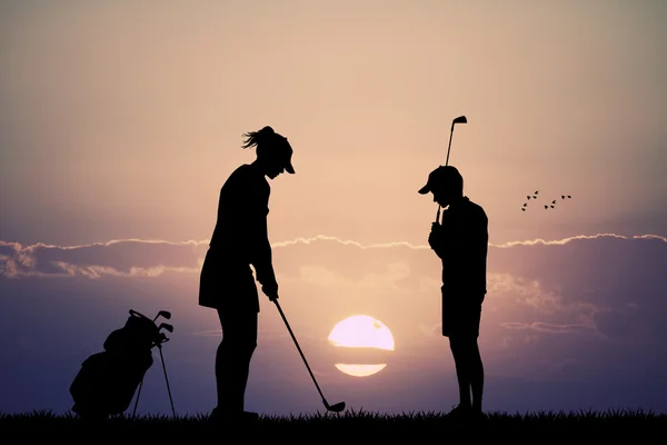 Couple plays golf — Stock Photo, Image