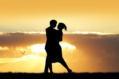 gün batımında sevenler siluet