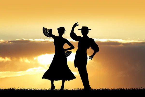 man and woman dancing Flamenco