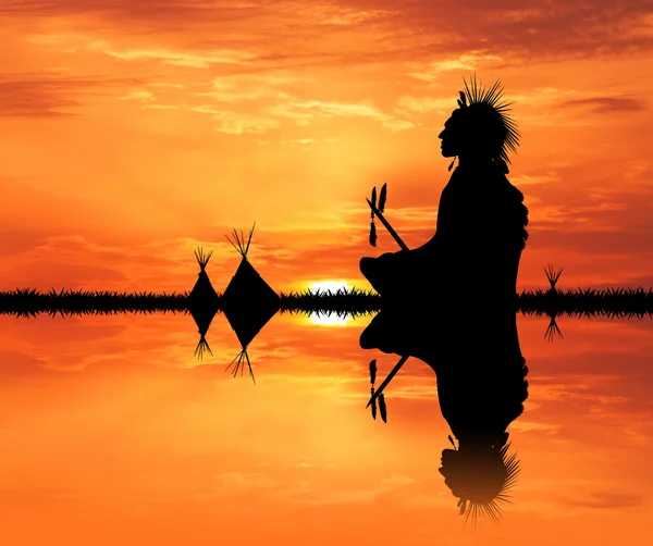 Native American Indian in the tent at sunset — Stock Photo, Image