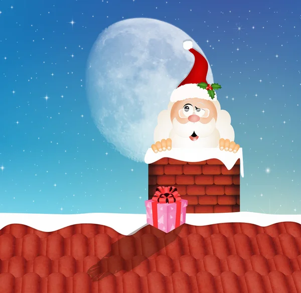 Weihnachtsmann im Schornstein — Stockfoto