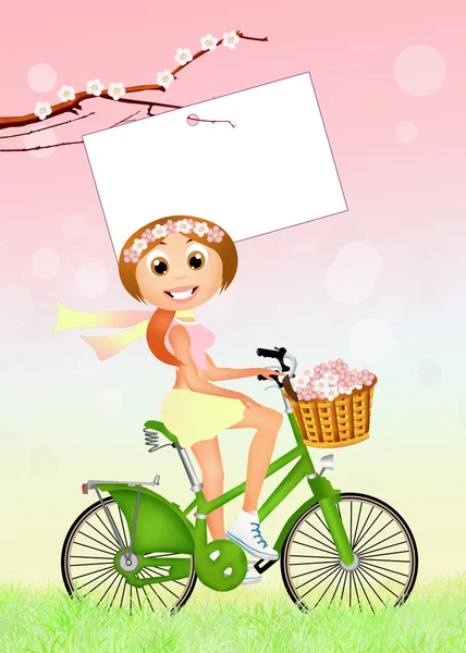 Girl on bike in spring — Stock Photo, Image