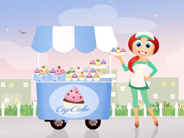 Dziewczyna sprzedawać cupcakes — Zdjęcie stockowe
