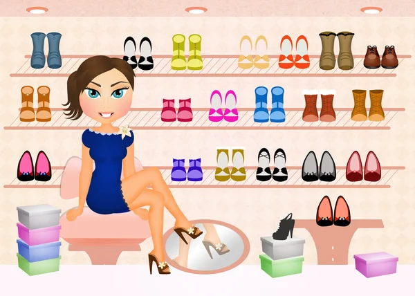 Vrouw in schoenen winkel — Stockfoto