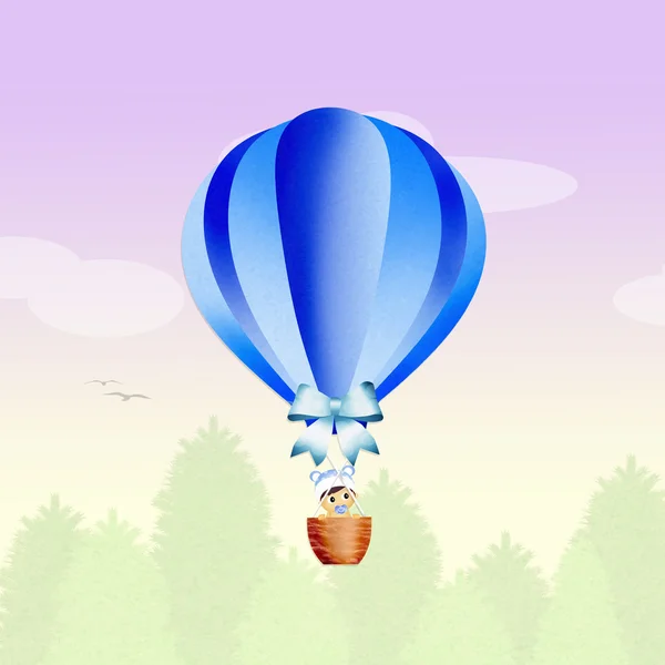 Baby on hot air balloon — Stock Photo, Image