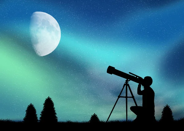 Člověk se dívá na polární záře s dalekohledu — Stock fotografie
