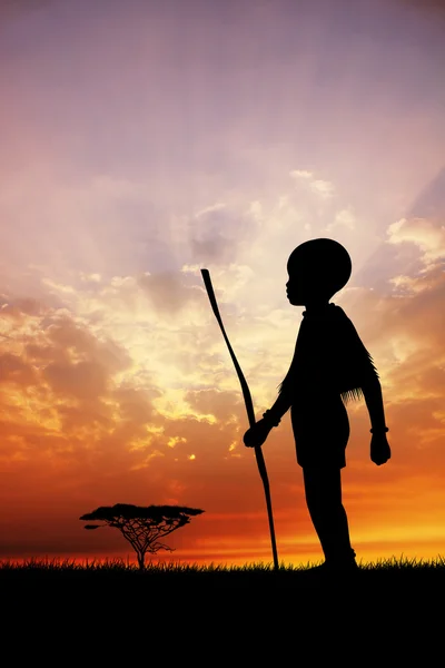 Enfant africain au coucher du soleil — Photo