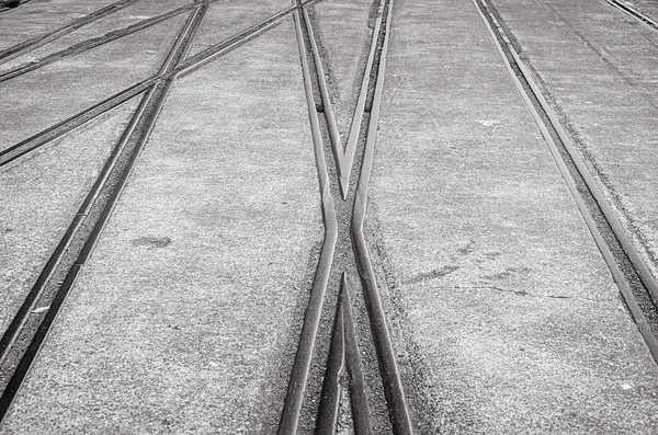 Background with railway crossing on gray asphalt — Stock Photo, Image