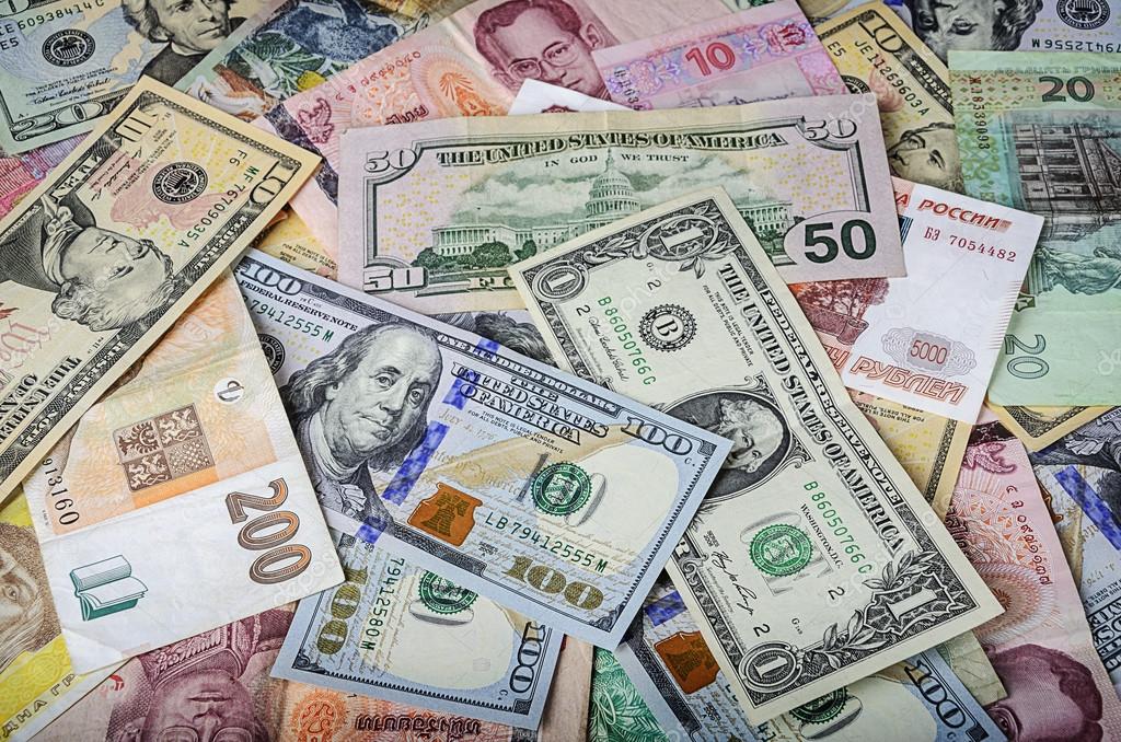 A collection of various foreign currencies from countries spanning the A collection of various foreign currencies from countries spanning the