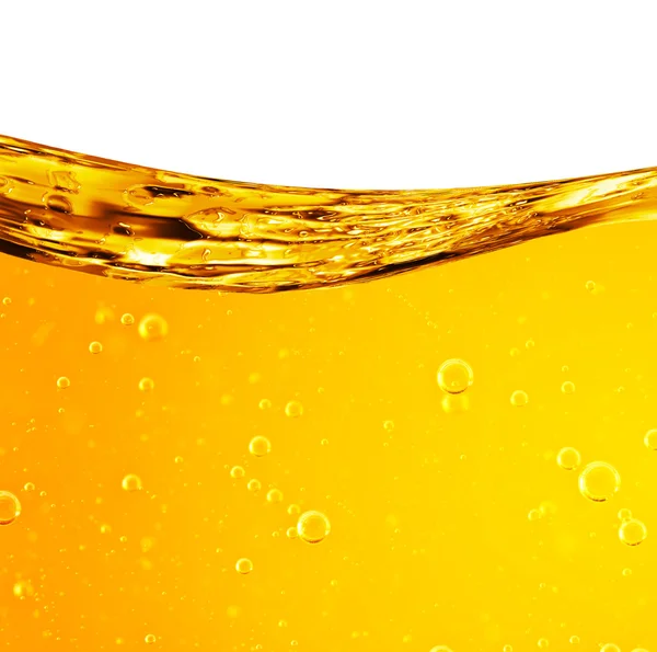 Liquid flows yellow, for the project, oil, honey, beer — Stock Photo, Image