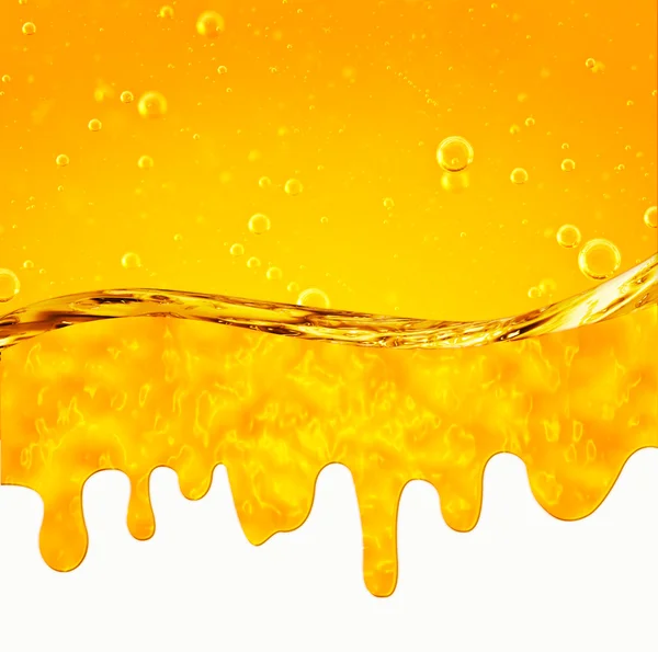 Flüssigkeit fließt gelb — Stockfoto