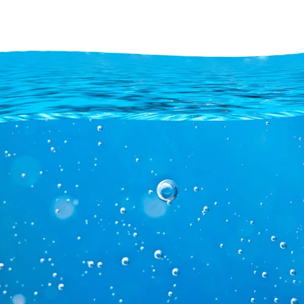Agua de onda azul, burbujas de aire de primer plano — Foto de Stock