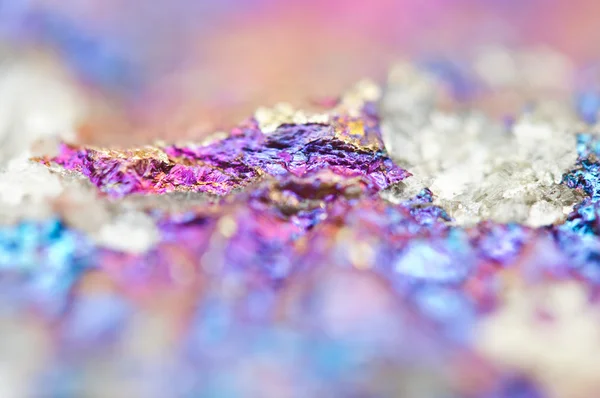 Bornite ore crystallizes mineral its blurred natural background. — Stock Photo, Image