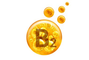  B2 vitamini kapsülü. Beyaz arka planda baloncuklu altın toplar. Sağlıklı yaşam tarzı kavramı.