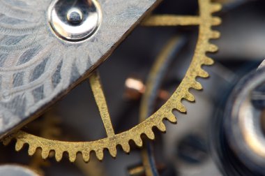 metal cogwheels ile arka plan bir saat gibi. Makro 