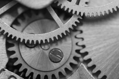 siyah beyaz arka plan ile metal cogwheels bir saat gibi. Makro 