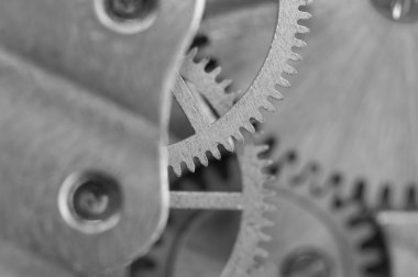 siyah beyaz arka plan ile metal cogwheels bir clockwork.