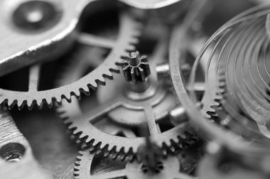 siyah beyaz arka plan ile metal cogwheels bir saat gibi. kavram