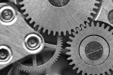siyah beyaz arka plan ile metal cogwheels bir saat gibi. kavram