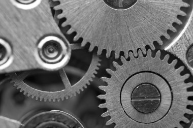 siyah beyaz arka plan ile metal cogwheels bir saat gibi. kavram