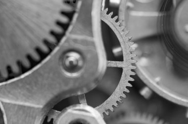 siyah beyaz arka plan ile metal cogwheels bir saat gibi. kavram