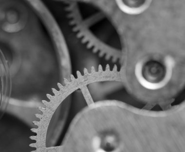 siyah beyaz arka plan ile metal cogwheels bir saat gibi. kavram