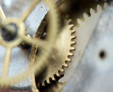 metal cogwheels ile arka plan bir saat gibi. kavramsal fotoğraf