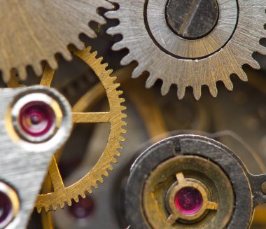 metal cogwheels ile arka plan bir saat gibi. kavramsal fotoğraf