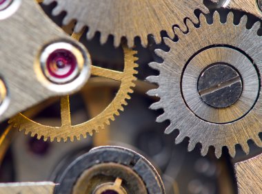 metal cogwheels ile arka plan bir saat gibi. kavramsal fotoğraf