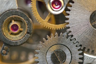 metal cogwheels ile arka plan bir saat gibi. kavramsal fotoğraf