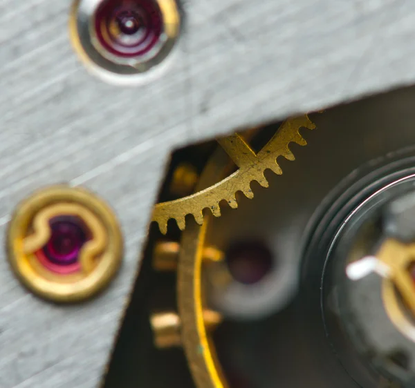 時計じかけの金属歯車と背景します。概念的な写真 — ストック写真