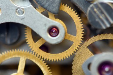 metal cogwheels ile arka plan bir saat gibi. kavramsal fotoğraf