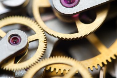 metal cogwheels ile arka plan bir saat gibi. kavramsal fotoğraf