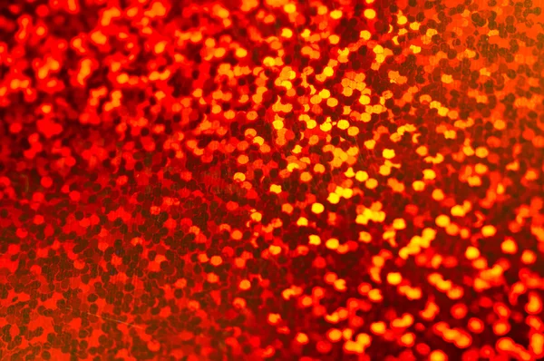 Holiday shiny blurry very bright red background. Macro — Stock Photo, Image