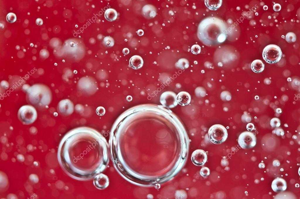 air bubbles in red water. macro