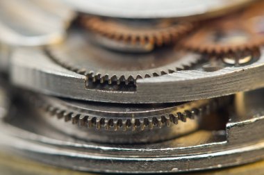 metal cogwheels ile arka plan bir saat gibi. kavramsal fotoğraf