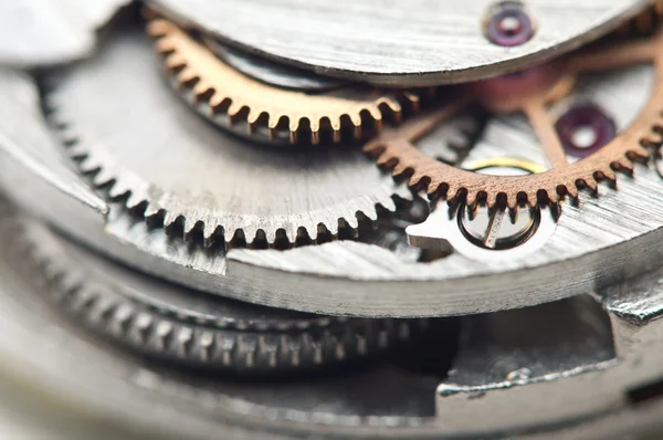 Arrière-plan avec roues dentées en métal une horloge. Photo conceptuelle — Photo