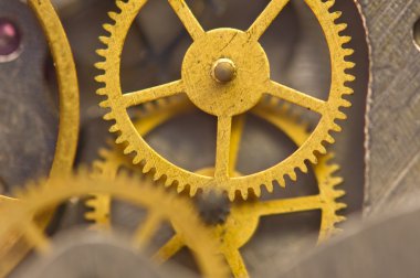 Arka plan ile altın metal cogwheels saat içinde. Makro. 